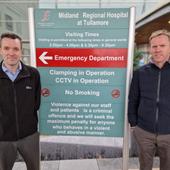 Mildlands Regional Hospital at Tullamore Sign with a AES Recycling Rep and Manager of the hospital either side